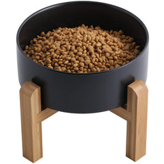 Addogyy black elevated dog bowl with wood stand providing stable, easy-access feeding.
