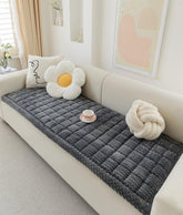 AEEISHOMEREFORM couch cover on a dark grey sofa protecting furniture from pets