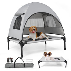Aimease elevated outdoor dog bed with canopy during camping setup for cooling shade
