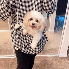 ALYC Pet Pouch Hoodie model wearing during city strolls with pet