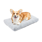 Cama para perro mediana en jaula de Amazon Basics, descanso cómodo y seguro.
