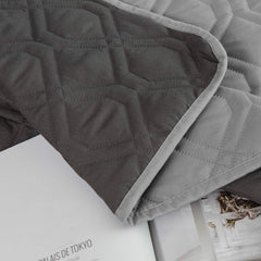 Ameritex durable stitching on protector covering a lounge for long-lasting use.