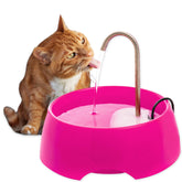 Amicus Aqua Mini pink water fountain viewed in bowl promotes enticing hydration.