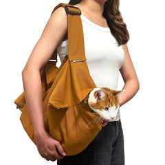 Amkune Cat Carrier Pouch with caramel neck opening for gentle restraint during vet visits or grooming.