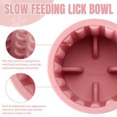 Animire Dog Lick Bowl pink filled with treats for enrichment.