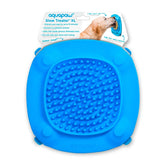 Aquapaw Lick Mat on shower wall provides distraction during bath time with treats.