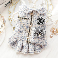 AZA dog princess dress white detail shows crown-inspired buttons and delicate trim.