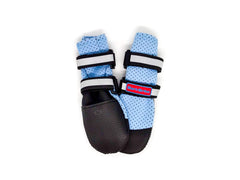 Bark Brite neoprene paw boots on dog demonstrate secure fit during activities.