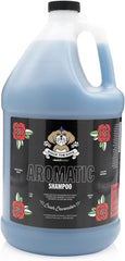 Bark2Basics Rock The Dog shampoo lavender bottle pour for calming bath-time aromatherapy.