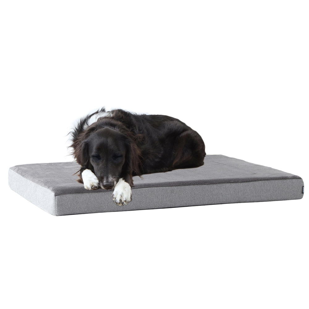 BARKBOX Orthopedic Bed memory foam closeup showing contour support for joints.
