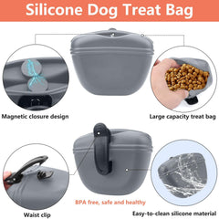 BARKIE dog clicker with wrist strap in use for positive reinforcement during session.