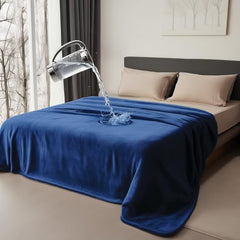 Bedding Aid king-size waterproof blanket shields beds from spills and accidents.