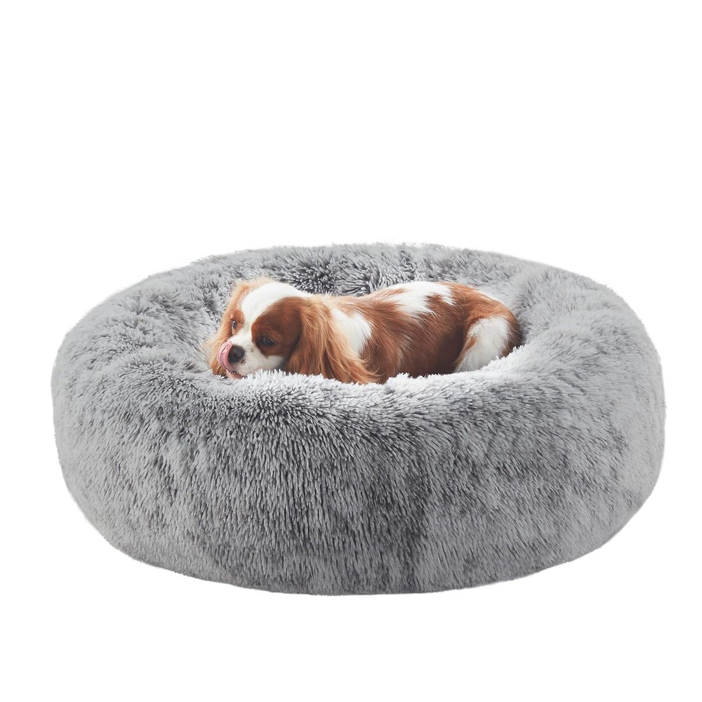 BedStill 30-inch donut dog bed in dark grey provides cozy nesting for medium dogs.