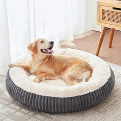 BedStill donut bed top view highlights supportive shape for larger dogs with joint relief potential.