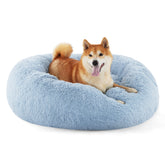 Bedsure calming dog bed donut shape offers secure curling for restful naps.