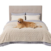 Bedsure waterproof dog blanket on bed protects against spills and accidents.