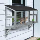 beeNbkks catio window box perch lets indoor cats enjoy safe outdoor views.