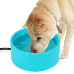 Berverra heated dog bowl outdoors keeps water from freezing for pets.