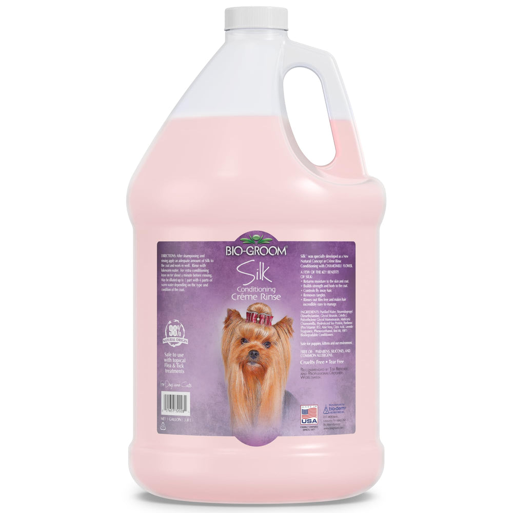 Bio-Groom Silk Creme Rinse bottle pouring for a gentle detangler
