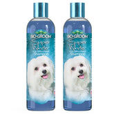 Bio-Groom Super Whitening Dog Shampoo bottle demonstrates bright coat enhancement for white fur.
