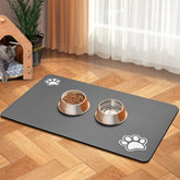 Blue Aye pet feeding mat absorbs water around the water bowl, protecting floors.