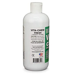 Vitachem drops dispense into a tank, supporting color and growth in community freshwater fish