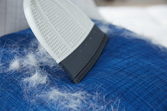 Broombi works on fabrics and furniture to remove lint from pillows bedding and more