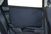 Bushwhacker Vehicle Door Protector shows dogs on the door edge, preventing scratches and dirt.