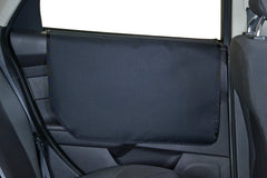 Bushwhacker Vehicle Door Protector shows dogs on the door edge, preventing scratches and dirt.