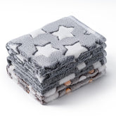 CADONO star-print pet blanket offers cozy warmth for lounging on the couch.