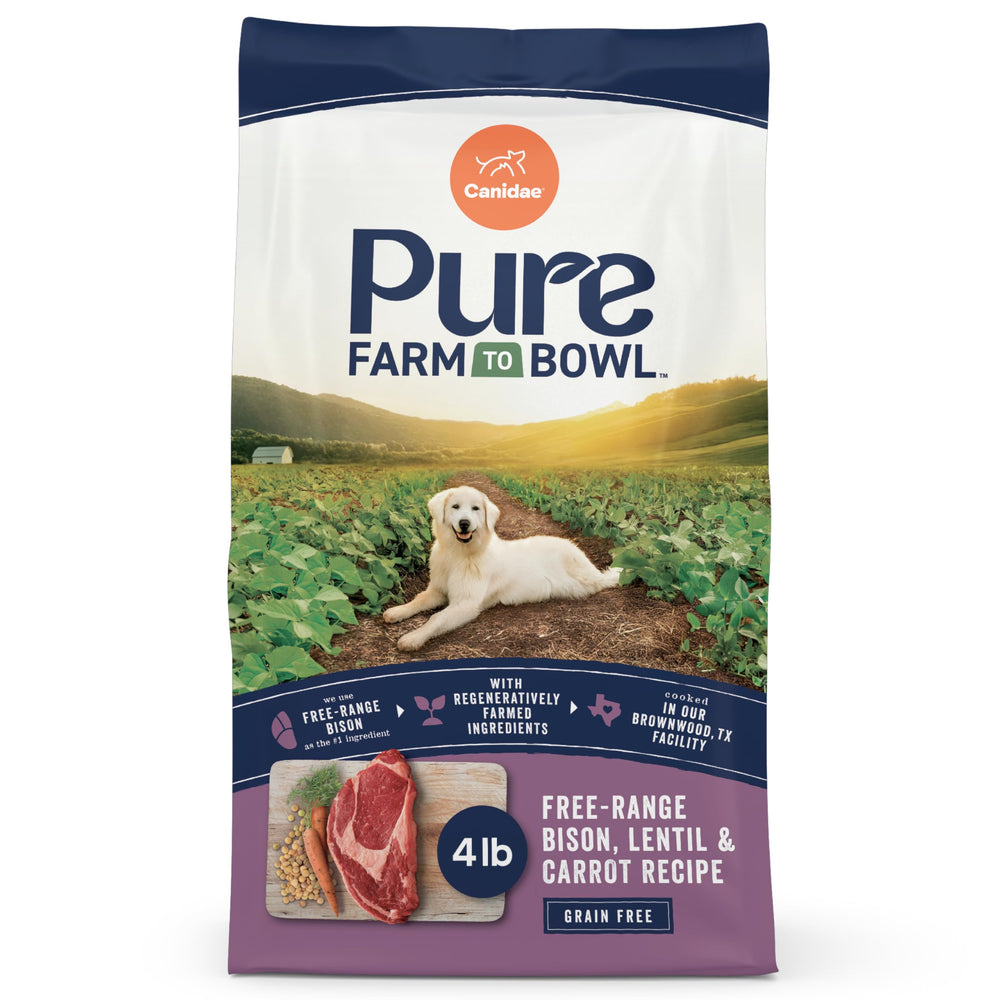 CANIDAE Pure Farm free-range bison kibble in a bowl for lean muscle support.