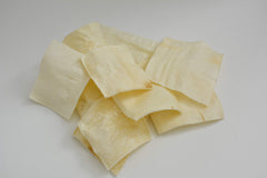 Canine Butcher Shop thick-cut rawhide image showcases chew time extension and reduced breakage.