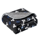 CAPT.SNOOZE waterproof dog blanket Navy Paws on sofa protects furniture from spills