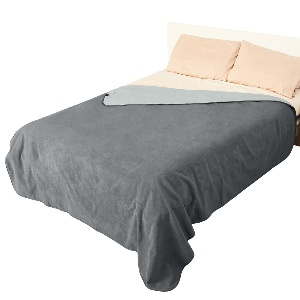 Catalonia waterproof blanket on bed intimate scene for protected, comfy moments.