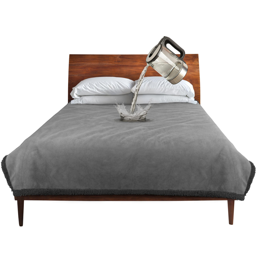 Catalonia waterproof blanket on bed protector keeps liquids away for clean, dry surfaces.