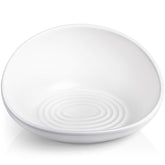 CatGuru ceramic no-spill bowl with raised back keeps feeding area tidy