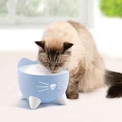 Catit PIXI fountain filter assembly shows three-stage filtration.