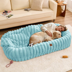 ChiXnuggle bed with blue-striped fabric for luxurious lounging and everyday relaxation.
