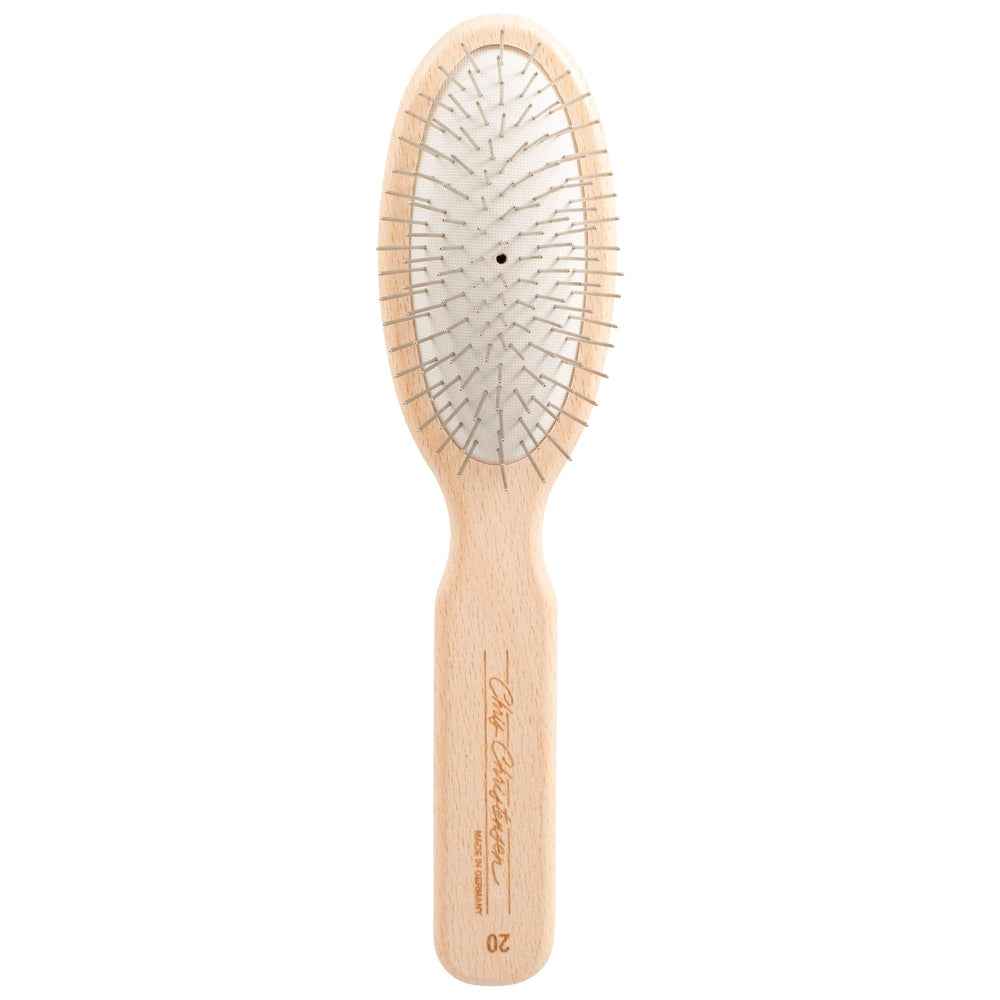 Chris Christensen 20 mm oval pin brush top view highlights professional-grade design for gentle detangling