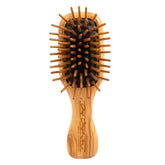 Chris Christensen Dog Brush 20mm Tiny Tot with wood pins for gentle detangling.