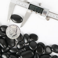 CJGQ black river rocks closeup in planter highlight natural color and texture.
