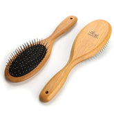 Clumsy Pets ball pin slicker brush closeup with bamboo handle for comfortable grooming.