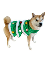 ComfyCamper dog Christmas Tree Cape with ornaments enhances festive look for photos.