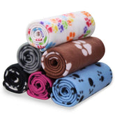 Comsmart paw-print blanket provides cozy warmth for kittens and puppies