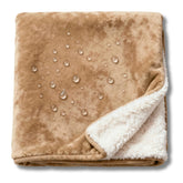 CREW FLX waterproof blanket bed closeup—soft fabric with triple-layer protection against spills