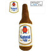 design LAB, Inc. Natural Light beer dog toy bottle pose for playful fetch