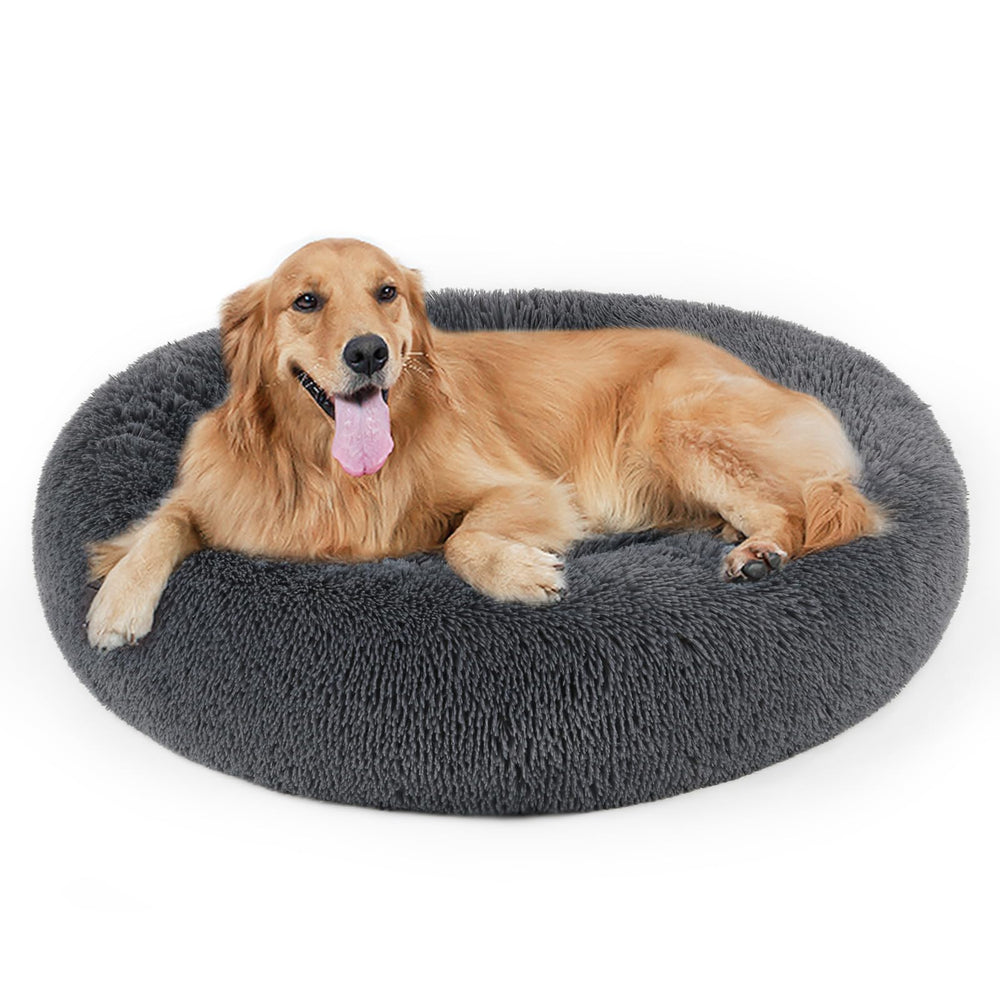 DogBaby donut calming bed, plush round design for cozy pet resting.