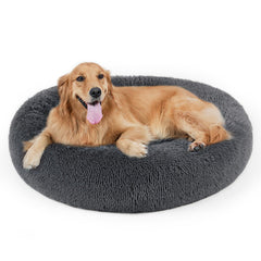 DogBaby donut calming bed, plush round design for cozy pet resting.