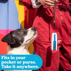 Doggie Don’t anti barking device wrist-strap image demonstrates secure carry during outdoor training