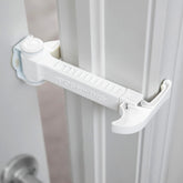 DOORWING portable door lock in use with easy, non-destructive setup.